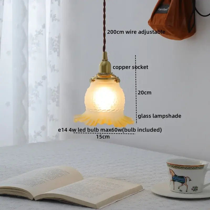 Modern brass and clear glass chandelier pendant light with frosted fluted glass shade and copper socket for dining room