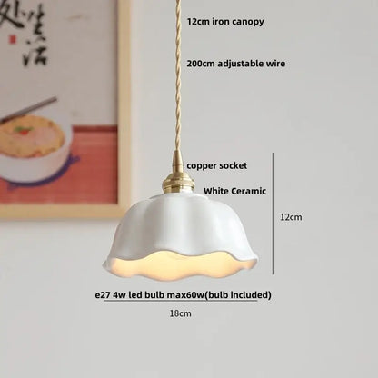 Modern brass and clear glass led pendant lamp with white ceramic fluted design and brass accents for dining room decorbites clear glass