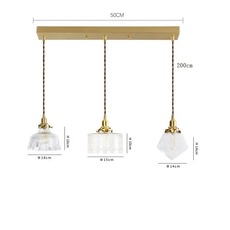 Modern brass pendant light with three clear glass led shades suspended by twisted copper cords for dining room decorbites clear glass