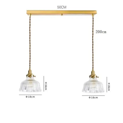Modern brass and clear glass led pendant light with gold-toned double pendants and decorbites clear glass shades
