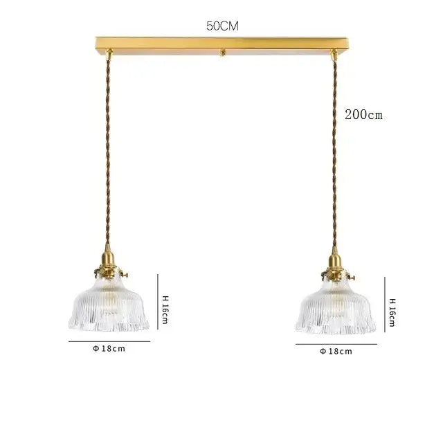 Modern brass and clear glass led pendant light with gold-toned double pendants and decorbites clear glass shades