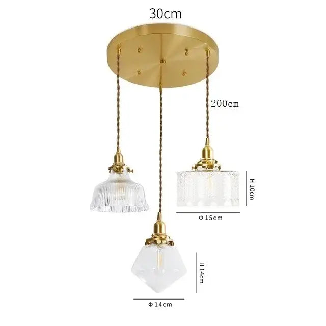 Modern brass pendant light with three clear glass led shades suspended by twisted chains for dining room decorbites clear glass
