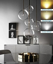 Modern brass and clear glass pendant light with globe design and brass accents for dining room decorbites clear glass chandelier