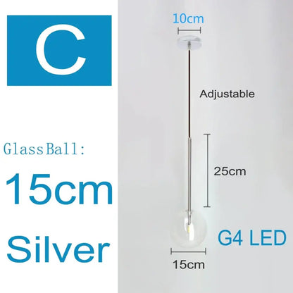 Modern brass and clear glass pendant light with silver glass ball, adjustable chrome stem, and g4 led bulb chandelier decorbites clear glass