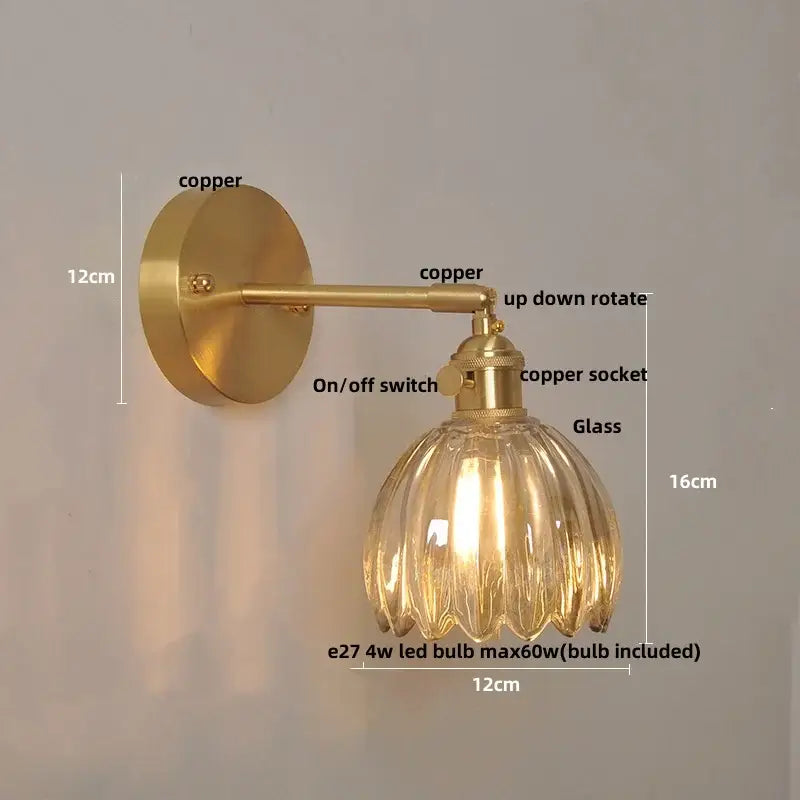 Modern brass wall lights with a clear glass fluted shade featuring a rotating sconce design for bedroom decorbites clear glass