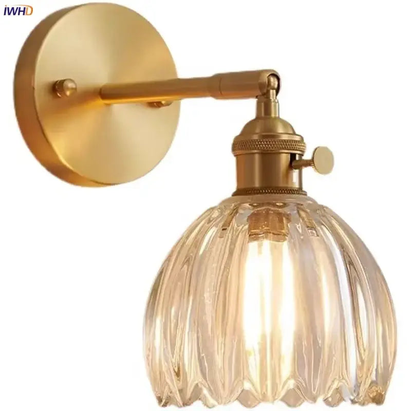 Modern brass wall lights with faceted clear glass shade by decorbites ideal for bedroom rotating sconce decor