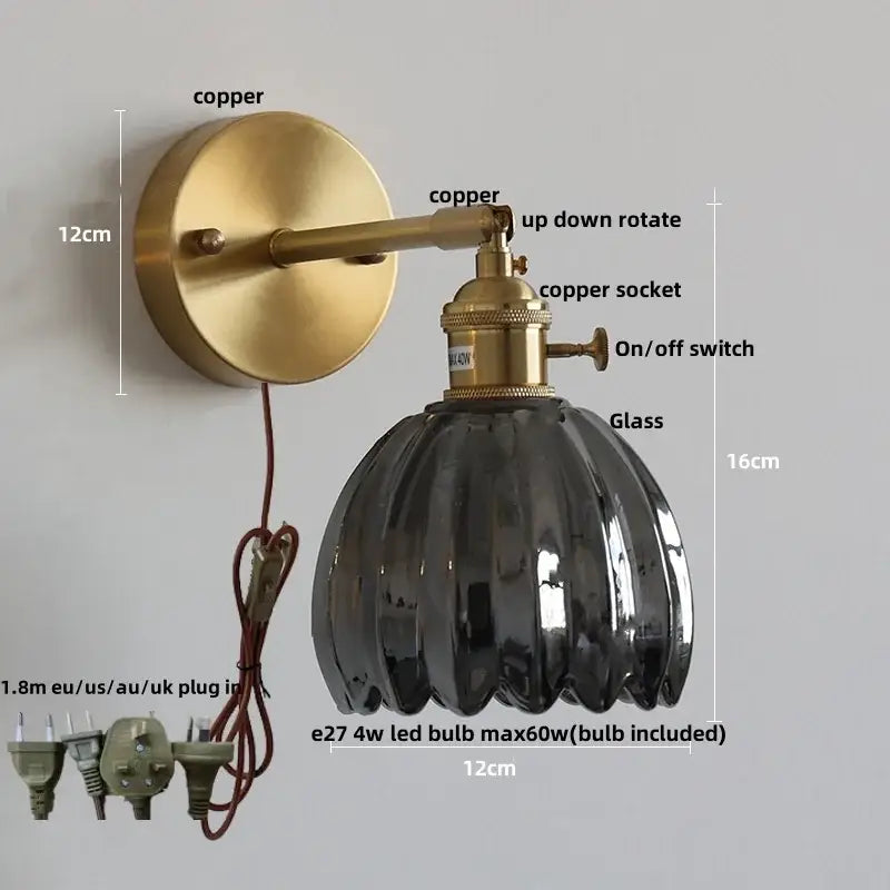 Modern brass wall lights featuring a brass finish with clear glass ribbed shade and copper socket for bedroom decorbites clear glass