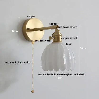 Modern brass and clear glass wall light featuring a vintage-style brass copper arm and fluted white glass shade by decorbites clear glass