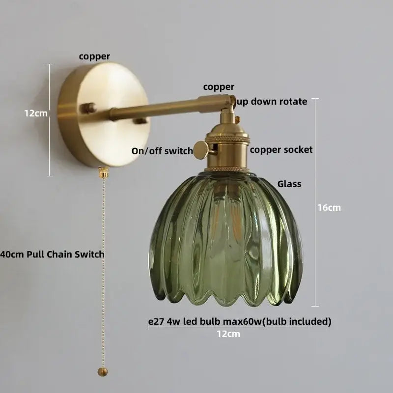 Modern brass wall lights with copper arm and olive green textured glass shade complement decorbites clear glass decor