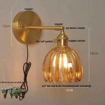 Brass-finished wall lights with clear glass fluted amber shade and adjustable arm for bedroom decorbites clear glass design