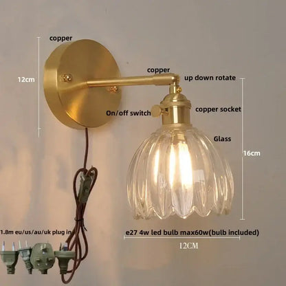 Modern brass and clear glass wall lights featuring a vintage-style rotating sconce with a fluted glass shade decorbites clear glass