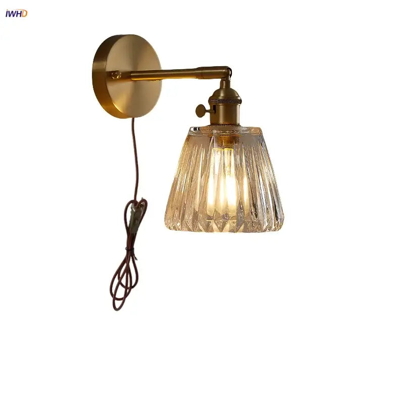 Modern brass wall lights with a clear glass faceted shade ideal for bedroom decorbites clear glass sconce