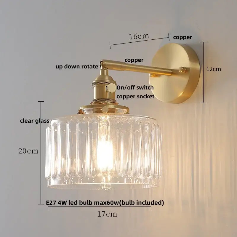 Modern brass wall lights featuring a vintage-style brass copper finish and clear glass shade for bedroom decorbites clear glass