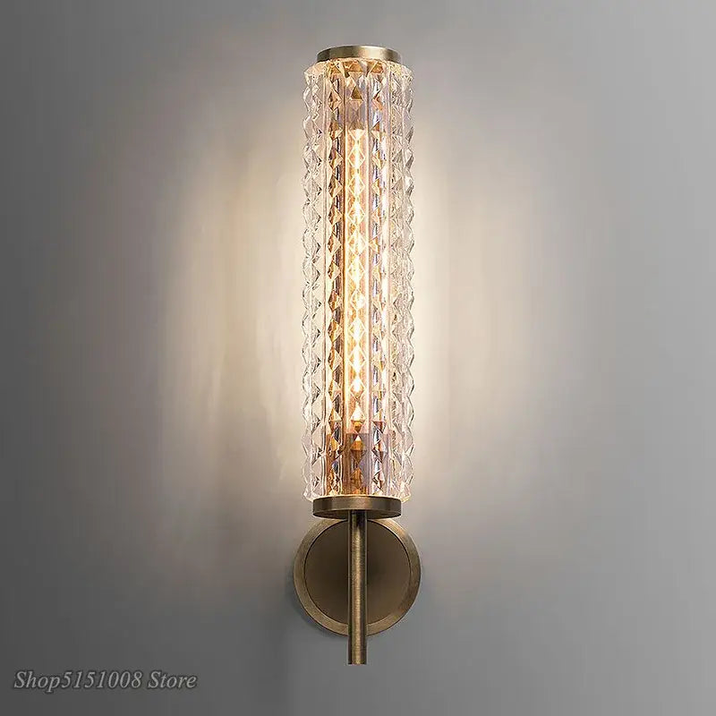 Modern brass and crystal copper wall sconce with clear faceted glass and warm light for living room decorbites crystal copper