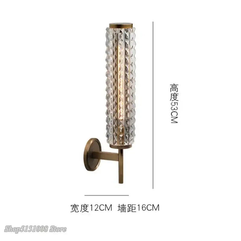 Modern brass and crystal copper wall sconce with textured glass cylinder and brass frame for living room lighting decorbites crystal copper