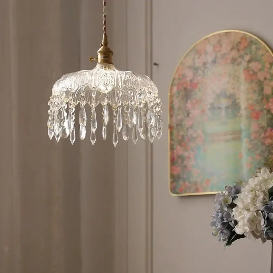 Modern brass and crystal glass led pendant lamp with clear glass chandelier and dangling teardrop pendants for dining room decorbites crystal glass