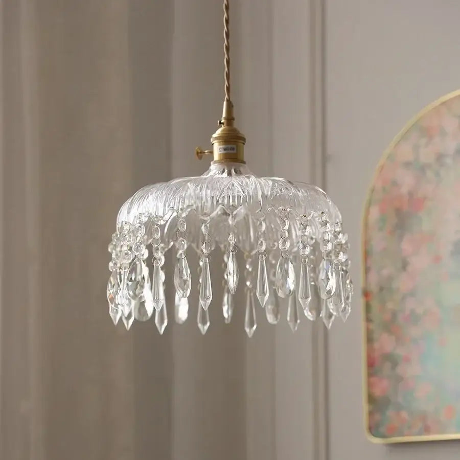 Modern brass and crystal glass led pendant lamp featuring clear glass chandelier with dangling teardrop pendants