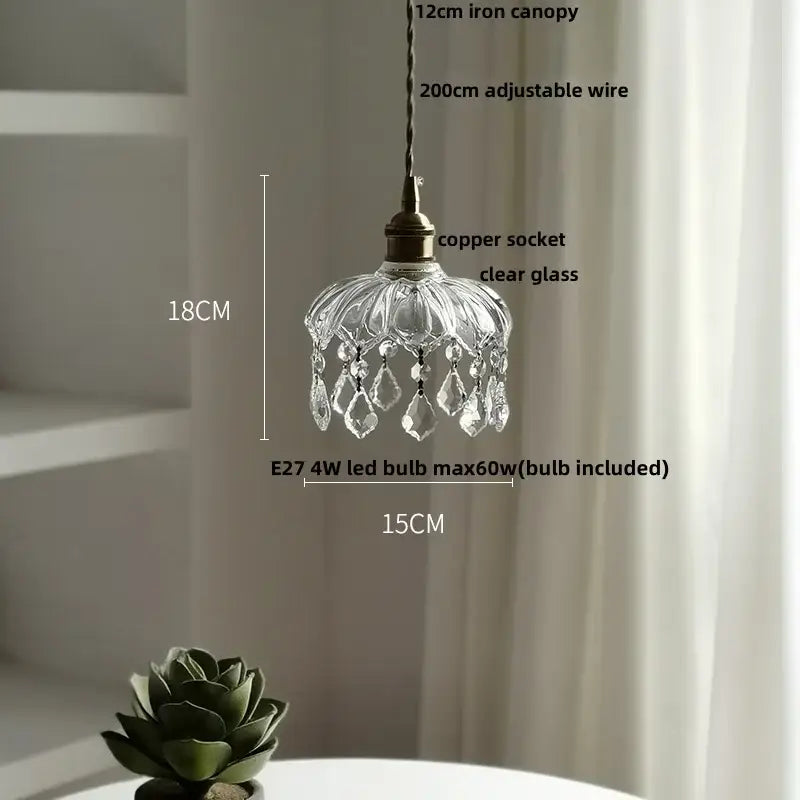 Modern brass and crystal glass led pendant lamp with clear glass and copper socket featuring decorbites crystal glass droplets