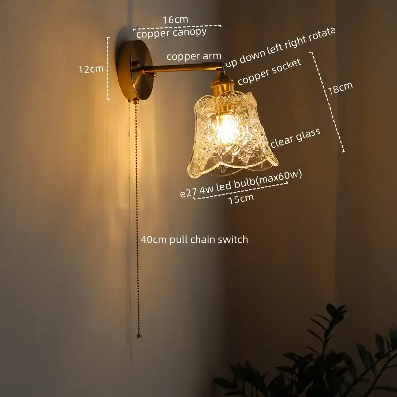 Modern brass and crystal led wall lamp featuring a copper sconce with floral etched glass and 40cm pull chain switch