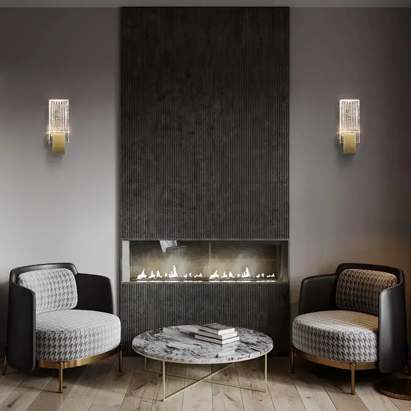 Modern brass and crystal wall light bedroom glass sconce paired with black and white houndstooth armchairs decorbites crystal wall light