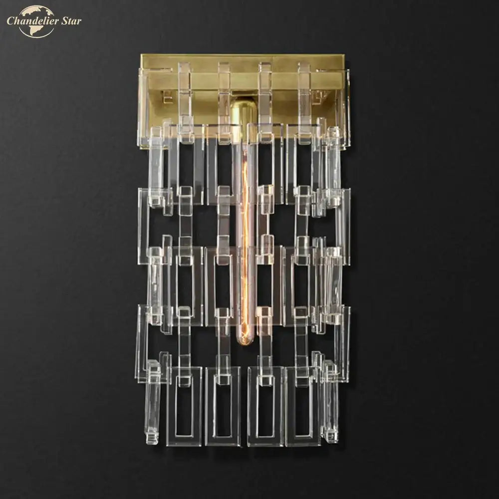 Modern brass and crystal wall sconce with clear acrylic geometric bars and exposed filament bulb for living room decorbites crystal wall