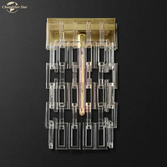 Modern brass and crystal wall sconce with clear acrylic geometric bars and exposed filament bulb for living room decorbites crystal wall