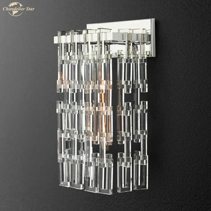 Modern brass and crystal wall sconce with sleek chrome finish and cascading clear glass tubes decorbites crystal wall lighting