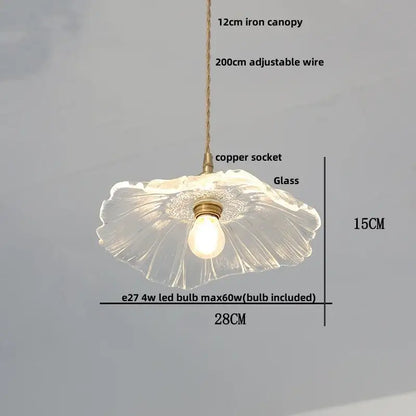 Modern brass and cut glass led pendant light with fluted translucent glass and brass accents for dining room use