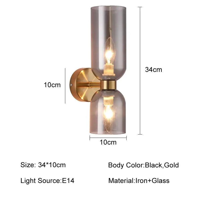 Modern brass wall lamps with decorbites glass ball shades in smoked glass and gold-toned iron base for bedroom use