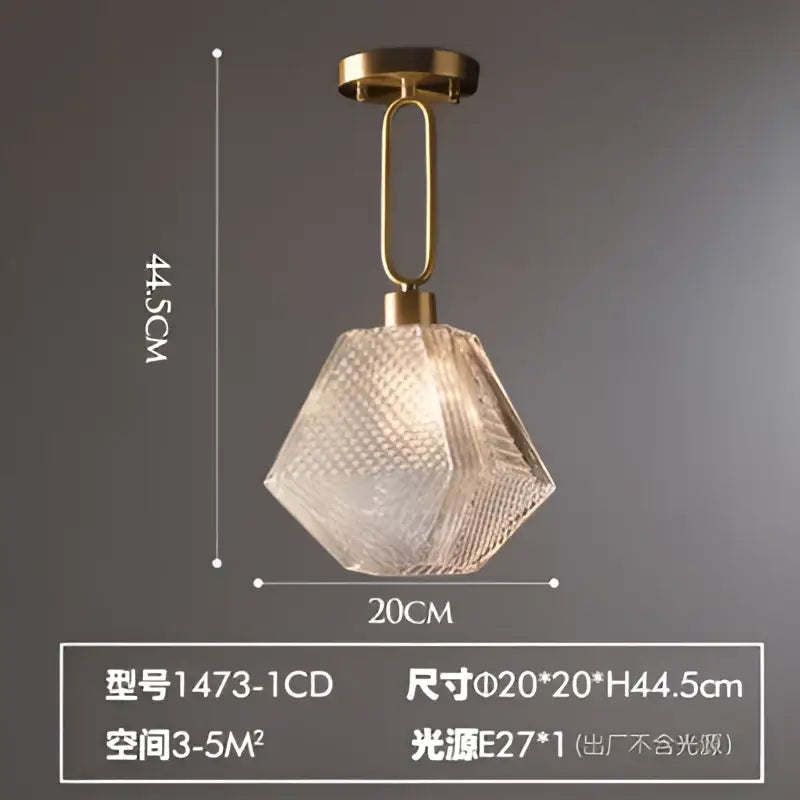 Modern brass and diamond glass pendant lamp featuring a geometric glass pendant lamp with faceted textured design