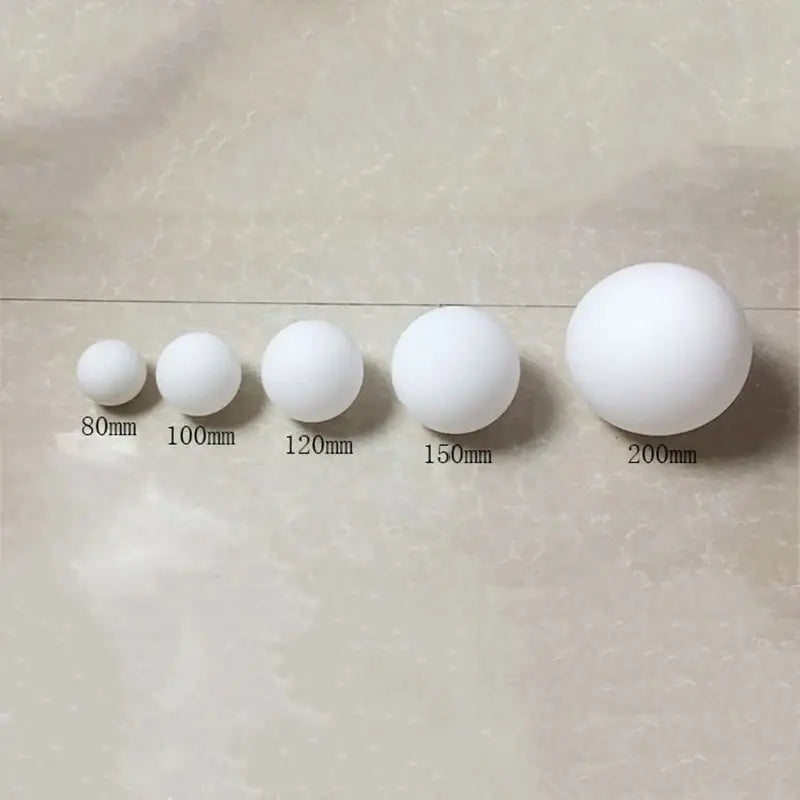 Modern brass and frosted glass ball pendant light featuring white spherical foam balls in sizes 80mm to 200mm decorbites glass ball pendant