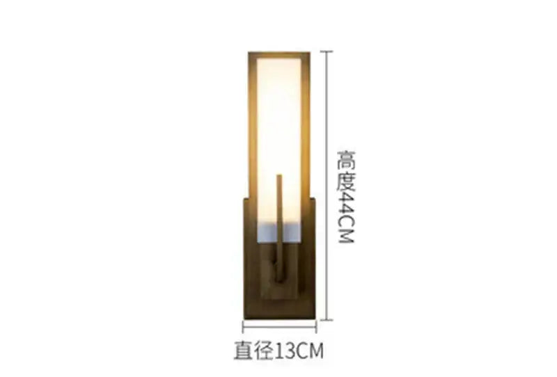 A modern brass and frosted glass led wall light with a rectangular vertical panel for stylish living room decorbites led wall lights