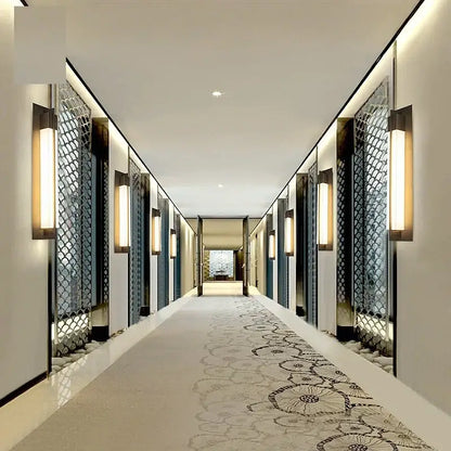 Modern brass and frosted glass led wall lights with sleek black frames and warm vertical panels for living room decorbites led wall lights
