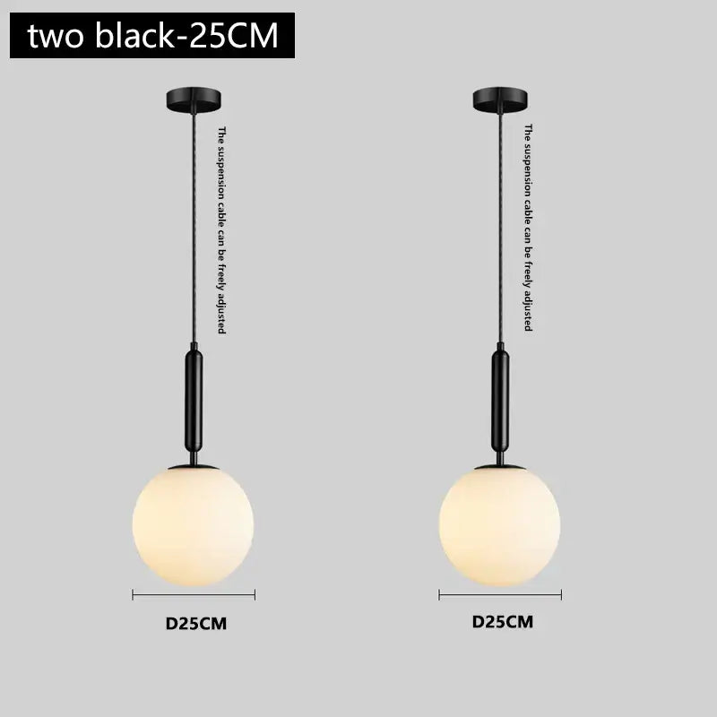 Modern brass and frosted glass chandelier pendant light with black spherical pendant lights and adjustable suspension cables