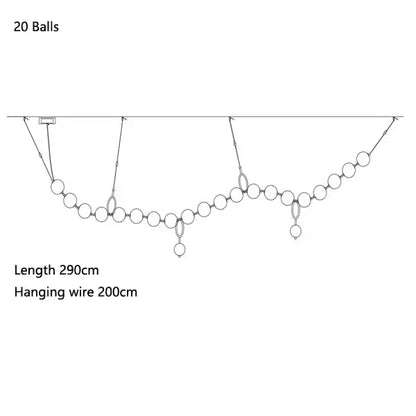 Modern brass and glass ball pendant light featuring 20 spherical glass orbs for dining room decorbites glass ball chandelier