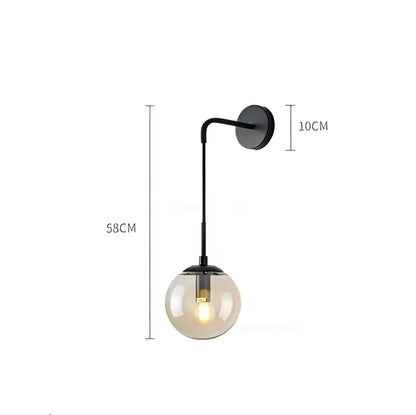 Black metal wall lamp with a smoked glass ball globe perfect for modern bedroom decorbites glass ball lighting