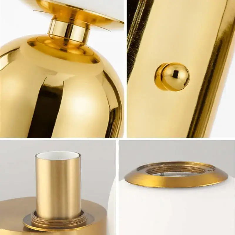Modern brass and glass desk lamp with gold-finished metal base and intricate mechanical details for decorbites glass desk