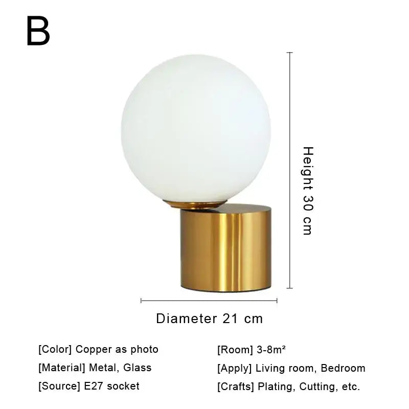 Modern brass and glass desk lamp with frosted spherical shade and polished copper base decorbites glass desk lamp