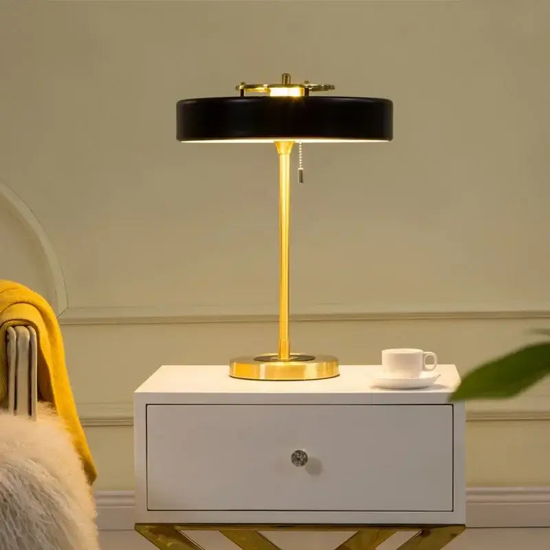 Black leather top table lamp with gold metal base and stem from decorbites scandinavia lighting led collection