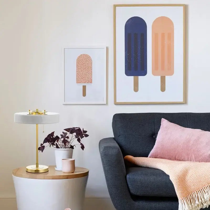 Modern minimalist table lamp with white circular shade and gold-toned metal base for decorbites scandinavia lighting led