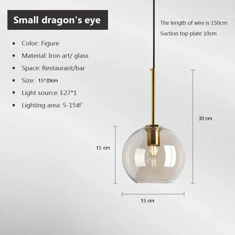 A sleek spherical glass pendant light with brass iron finish and e27 bulb for cord pendant installation