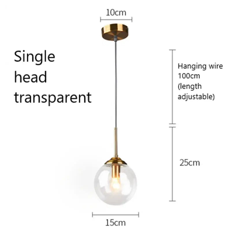 Modern brass and glass pendant lights featuring a transparent glass pendant with gold-toned fixture for kitchen dining room