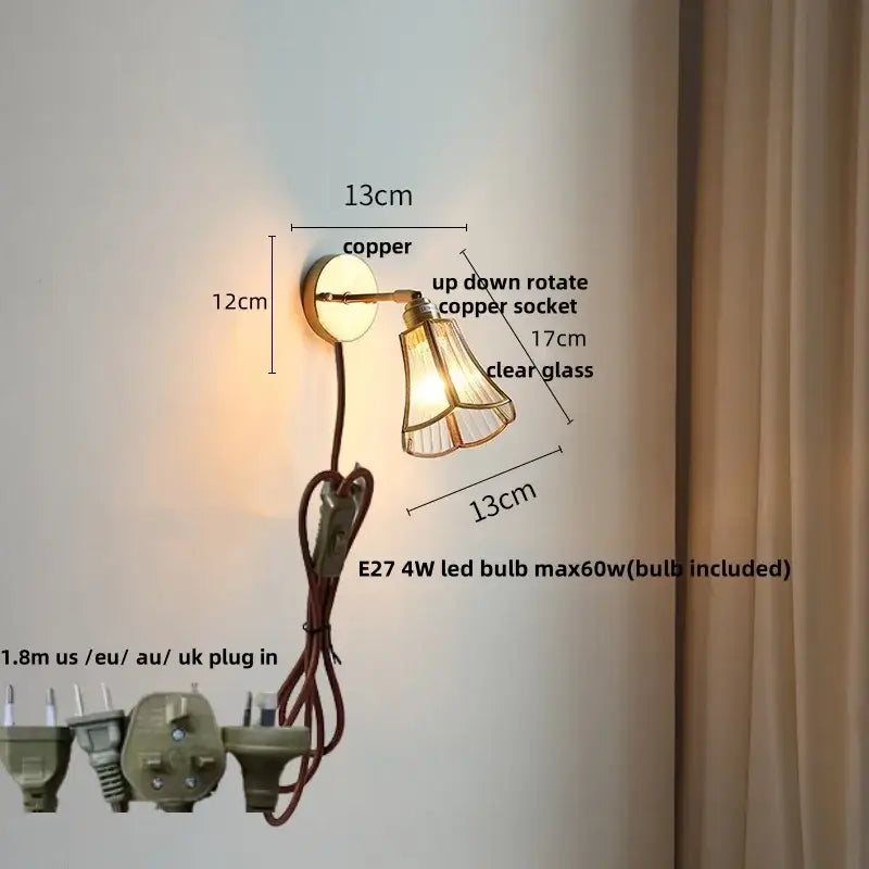 Modern brass and gray glass led wall sconce with copper socket and clear glass shade for bedroom lighting with pull chain