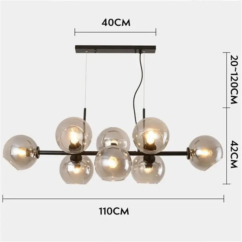 Modern black metal chandelier with six smoked glass globe shades and gray glass pendant lights for dining room use