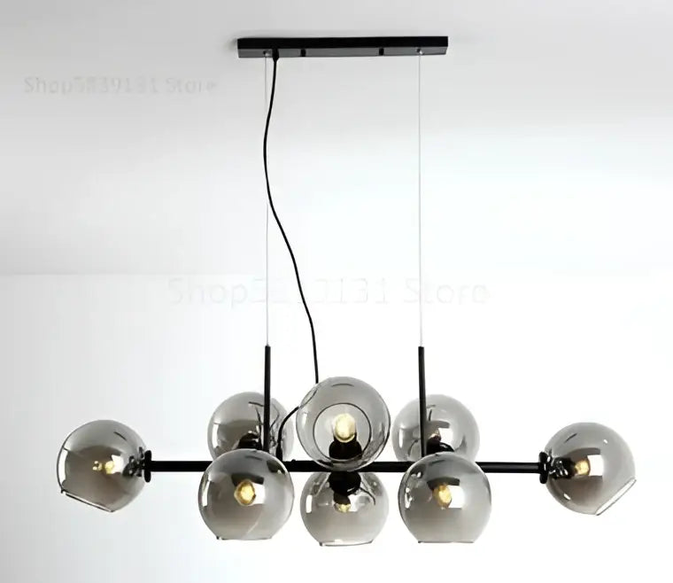 Modern black metal pendant lights with seven smoked gray glass globe shades for kitchen dining room lighting