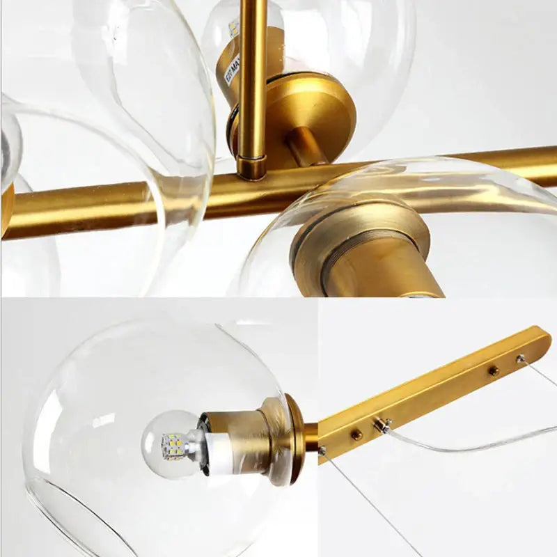 Modern brass pendant lights with gray glass globe shades and led bulbs for kitchen and dining room lighting