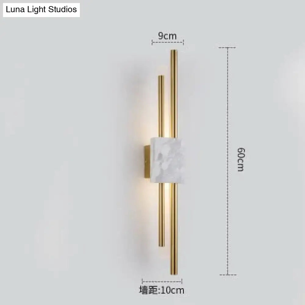 Modern brass and white marble led wall lamp with two vertical rods for living room use