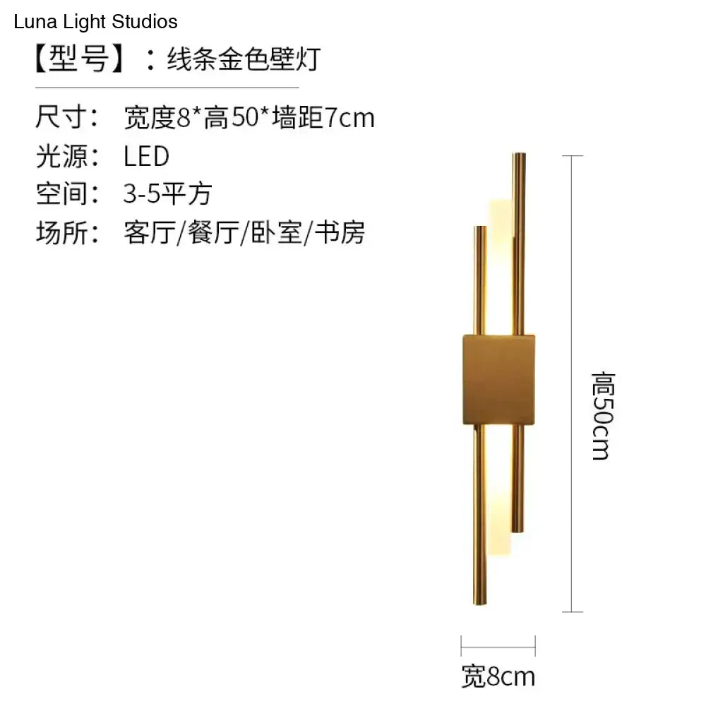 Modern brass and green marble led wall lamp with gold-toned linear design and illuminated central panel for living room