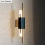 Modern brass and green marble led wall lamp with sleek brass finish and two vertical light bars for living room