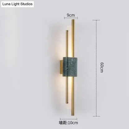 Modern brass and textured teal-green marble led wall lamp with two vertical rods for living room lighting